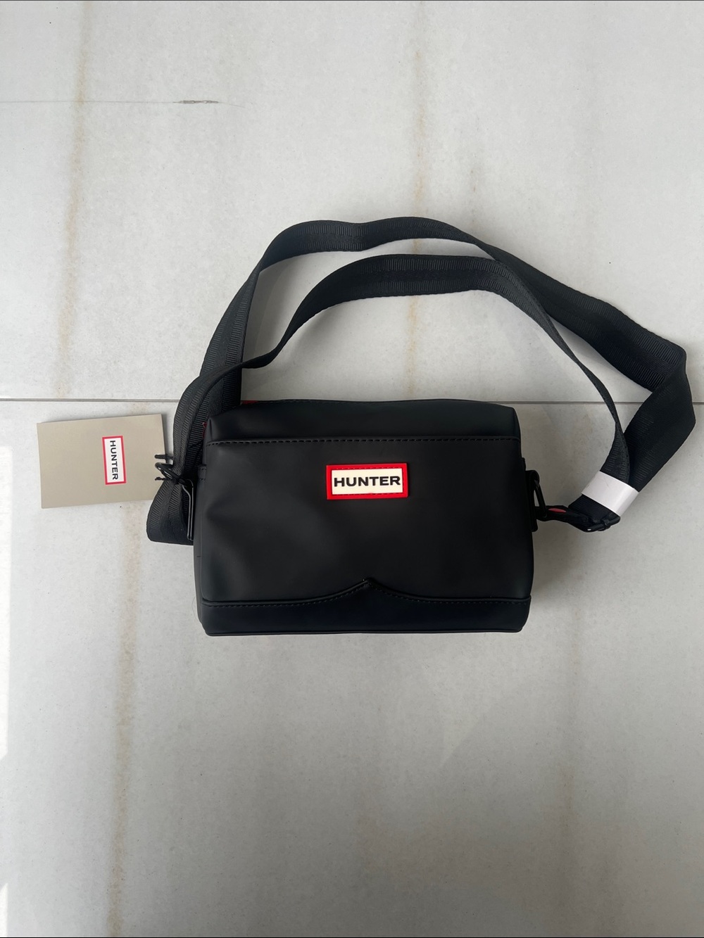 Hunter Black Crossbody Bag with Red and White Logo
